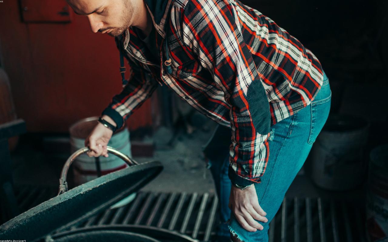 Tradesman at work in his workshop